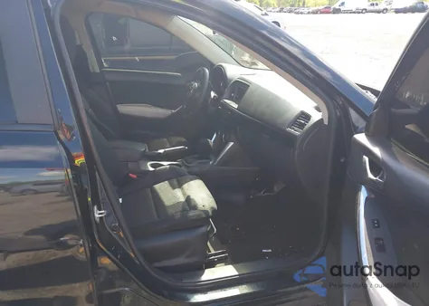 2014 Mazda Cx-5 Touring z USA, uszkodzony, nr VIN JM3KE2CY3E0330365